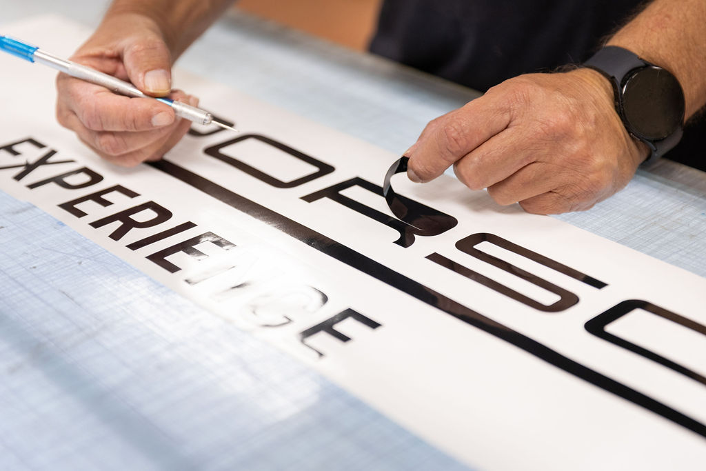 working on a sign