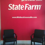 red wall sign for state farm